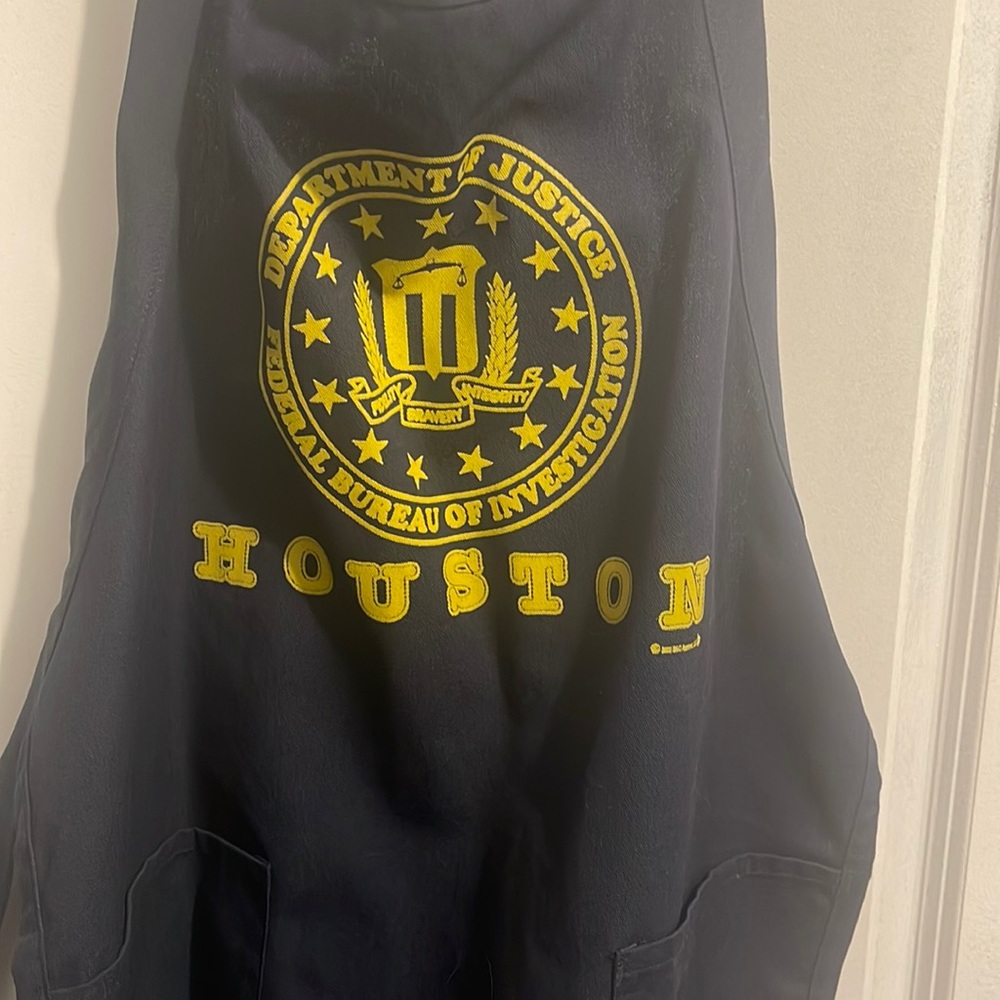 Apron, blue and gold FBI Houston cooking apron. Never used. Great condition.
